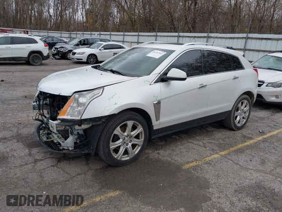 2014 Cadillac SRX Premium Collection z VIN 3GYFNDE34ES548826, wystawiony jako IAAI lot #40792942 z przebiegiem 115 984 mil mil oraz . Historia ofert i sprzedaży dostępna na DreamBid. Obrazek 19.