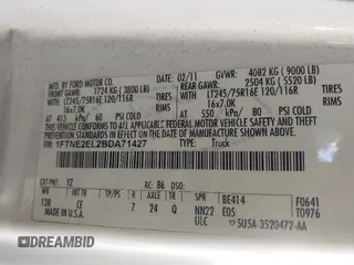 2011 Ford Econoline Cargo Commercial with VIN 1FTNE2EL2BDA71427, listed as a IAAI auction lot 41755582 with 157,531 mi miles. Bid and sale history available at carsss.com. Image 9.