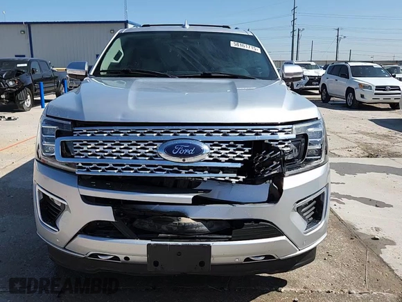 2019 Ford Expedition Platinum with VIN 1FMJU1MT4KEA65194, listed as a Copart auction lot 58161715 with 100,983 mi miles and Salvage title. Bid and sale history available at DreamBid. Image 14.