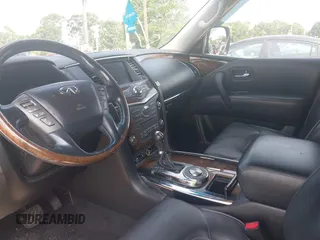 2013 Infiniti QX56 with VIN JN8AZ2NF7D9530166, listed as a IAAI auction lot 42360609 with 214,484 mi miles and . Bid and sale history available at DreamBid. Image 5.