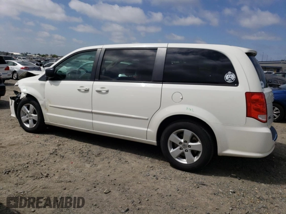 2013 Dodge Grand Caravan SE with VIN 2C4RDGBG3DR560962, listed as a Copart auction lot 53690225 with 124,796 mi miles and Salvage Title. Bid and sale history available at DreamBid. Image 2.