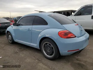 2012 Volkswagen Beetle 2.5L w/Sun/Sound/Nav PZEV with VIN 3VWJP7AT9CM618529, listed as a Copart auction lot 84940494 with 102,838 mi miles and Salvage Title. Bid and sale history available at carsss.com. Image 2.