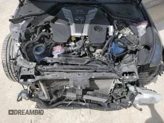 2017 Infiniti Q50 Premium z VIN JN1EV7APXHM732252, wystawiony jako Copart lot #50937795 z przebiegiem 109 219 mil mil oraz Szkody całkowita. Historia ofert i sprzedaży dostępna na DreamBid. Obrazek 11.
