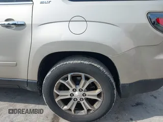 2014 GMC Acadia SLT z VIN 1GKKVRKD2EJ165066, wystawiony jako IAAI lot #41629615 z przebiegiem 193 811 mil mil oraz . Historia ofert i sprzedaży dostępna na DreamBid. Obrazek 6.
