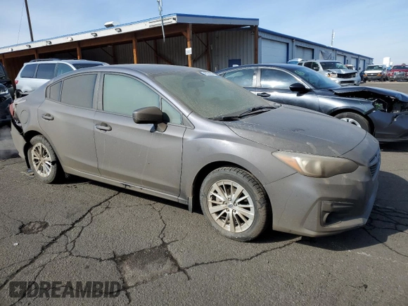 2017 Subaru Impreza Premium with VIN 4S3GKAD65H3623718, listed as a Copart auction lot 45234335 with 79,690 mi miles and Salvage title. Bid and sale history available at DreamBid. Image 4.