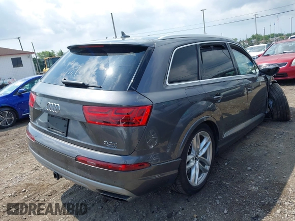 2018 Audi Q7 Prestige with VIN WA1VAAF75JD036199, listed as a IAAI auction lot 42557507 with 104,644 mi miles and . Bid and sale history available at DreamBid. Image 4.
