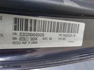 2016 Dodge Challenger SXT Plus with VIN 2C3CDZAGXGH264256, listed as a IAAI auction lot 41759183 with 128,358 mi miles. Bid and sale history available at carsss.com. Image 9.