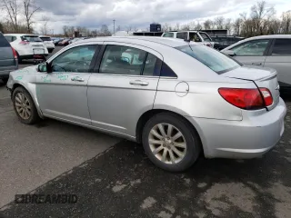 2010 Chrysler Sebring Limited with VIN 1C3CC5FB1AN207161, listed as a Copart auction lot 49421105 with 121,340 mi miles and Salvage Title. Bid and sale history available at DreamBid. Image 2.