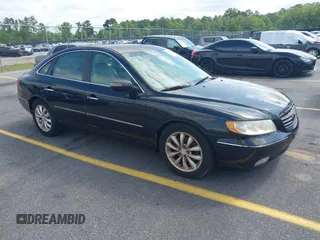 2007 Hyundai Azera SE z VIN KMHFC46F77A182333, wystawiony jako IAAI lot #42380216 z przebiegiem 227 553 mil mil oraz . Historia ofert i sprzedaży dostępna na DreamBid. Obrazek 1.