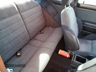1987 Nissan Sentra z VIN JN1PB2411HU026525, wystawiony jako Copart lot #78997744 z przebiegiem 65 716 mil mil oraz Nie do naprawy. Historia ofert i sprzedaży dostępna na DreamBid. Obrazek 10.