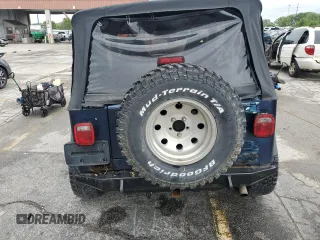1997 Jeep Wrangler Sport z VIN 1J4FY19S9VP490590, wystawiony jako Copart lot #57492775 z przebiegiem 161 648 mil mil oraz Szkoda całkowita • Salvage title. Historia ofert i sprzedaży dostępna na DreamBid. Obrazek 6.