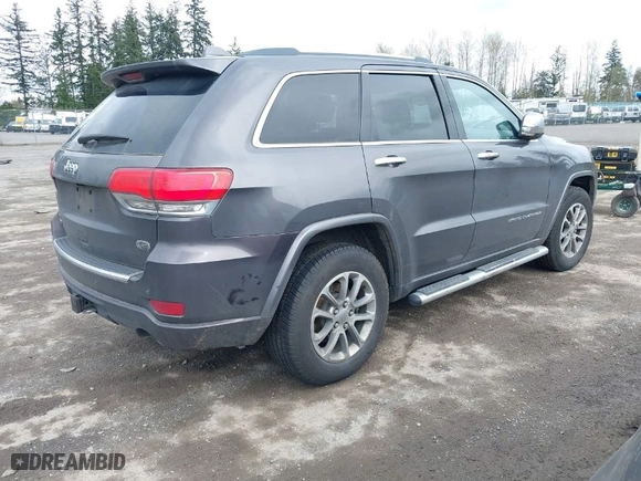 2014 Jeep Grand Cherokee Overland with VIN 1C4RJFCM7EC427204, listed as a IAAI auction lot 41934698 with 147,131 mi miles. Bid and sale history available at carsss.com. Image 4.