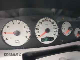 2000 Dodge Stratus z VIN 1B3EJ46X5YN246444, wystawiony jako Copart lot #84977054 z przebiegiem 159 505 mil mil oraz Nie do naprawy • Non repairable. Historia ofert i sprzedaży dostępna na DreamBid. Obrazek 9.