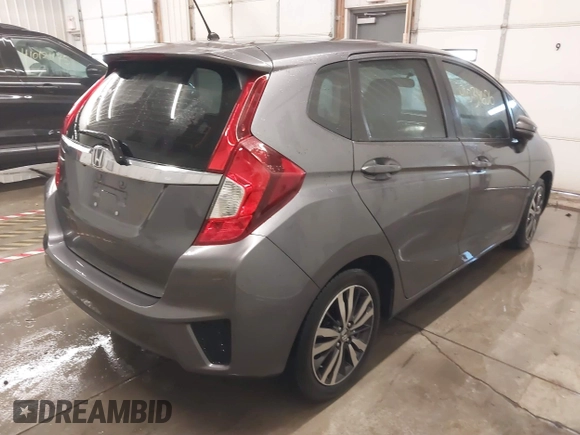2015 Honda Fit EX-L with VIN 3HGGK5H85FM755006, listed as a IAAI auction lot 41034606 with 97,294 mi miles and . Bid and sale history available at DreamBid. Image 4.