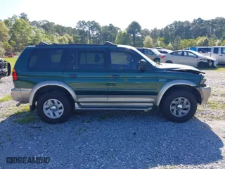 2000 Mitsubishi Montero Sport LS with VIN JA4LS31H0YP055199, listed as a IAAI auction lot 41990427 with 162,687 mi miles. Bid and sale history available at carsss.com. Image 14.