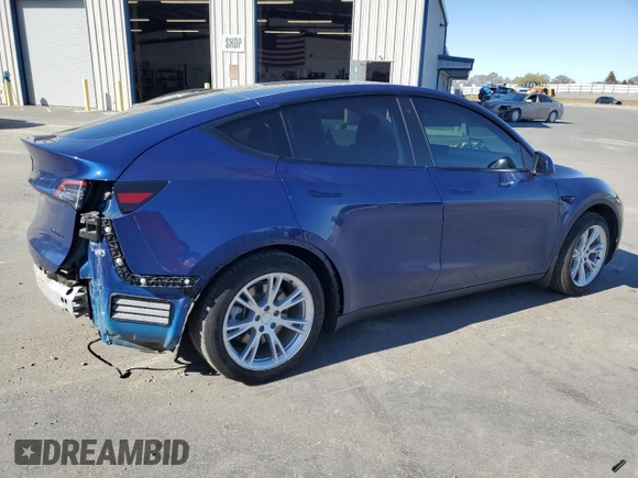 2021 Tesla Model Y Long Range z VIN 5YJYGDEE6MF089493, wystawiony jako Copart lot #48349575 z przebiegiem 52 245 mil mil oraz Szkoda całkowita • Salvage title. Historia ofert i sprzedaży dostępna na DreamBid. Obrazek 3.
