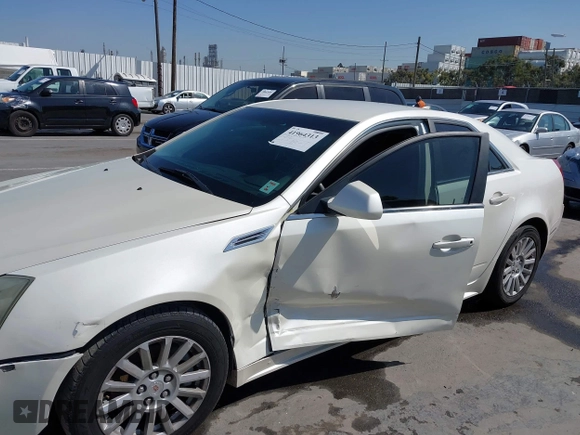 2010 Cadillac CTS with VIN 1G6DA5EG7A0135451, listed as a IAAI auction lot 41964313 with 136,172 mi miles and . Bid and sale history available at DreamBid. Image 6.