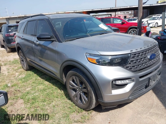 2022 Ford Explorer XLT z VIN 1FMSK7DH8NGB98882, wystawiony jako IAAI lot #41927913 z przebiegiem 48 179 mil mil oraz . Historia ofert i sprzedaży dostępna na DreamBid. Obrazek 1.