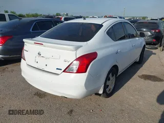 2014 Nissan Versa SV with VIN 3N1CN7AP5EL853686, listed as a IAAI auction lot 42058524 with 156,947 mi miles. Bid and sale history available at carsss.com. Image 4.