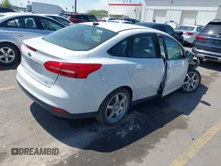 2017 Ford Focus SE with VIN 1FADP3F24HL232527, listed as a IAAI auction lot 42110702 with 95,327 mi miles and . Bid and sale history available at DreamBid. Image 4.
