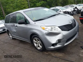 2014 Toyota Sienna L with VIN 5TDZK3DC7ES458064, listed as a IAAI auction lot 42192536 with 476,631 mi miles and . Bid and sale history available at DreamBid. Image 1.