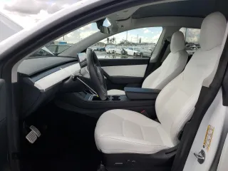 2021 Tesla Model Y Performance with VIN 5YJYGDEF4MF201815, listed as a Copart auction lot 42453075 with 76,888 mi miles and Salvage Title. Bid and sale history available at DreamBid. Image 7.