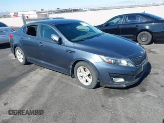 2015 Kia Optima LX z VIN KNAGM4A73F5605256, wystawiony jako IAAI lot #42459022 z przebiegiem 180 233 mil mil oraz . Historia ofert i sprzedaży dostępna na DreamBid. Obrazek 1.