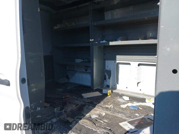 2016 Ford Transit Cargo with VIN 1FTYR1CM7GKA48493, listed as a IAAI auction lot 41363457 with 184,305 mi miles and . Bid and sale history available at DreamBid. Image 8.