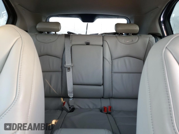 2020 Cadillac XT4 FWD Premium Luxury z VIN 1GYFZCR49LF118146, wystawiony jako Copart lot #82495614 z przebiegiem Nie podano mil oraz Nie do naprawy • Non repairable. Historia ofert i sprzedaży dostępna na DreamBid. Obrazek 10.