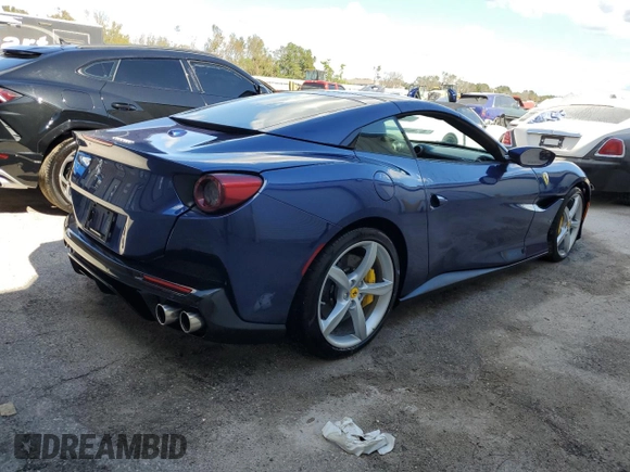 2019 Ferrari Portofino z VIN ZFF89FPAXK0242549, wystawiony jako Copart lot #74454234 z przebiegiem Nie podano mil oraz Nie do naprawy. Historia ofert i sprzedaży dostępna na DreamBid. Obrazek 3.