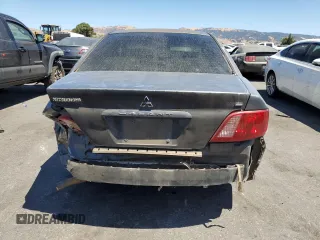 2002 Mitsubishi Galant ES z VIN 4A3AA46G02E097295, wystawiony jako Copart lot #67977274 z przebiegiem 149 375 mil mil oraz Szkody całkowita. Historia ofert i sprzedaży dostępna na DreamBid. Obrazek 6.