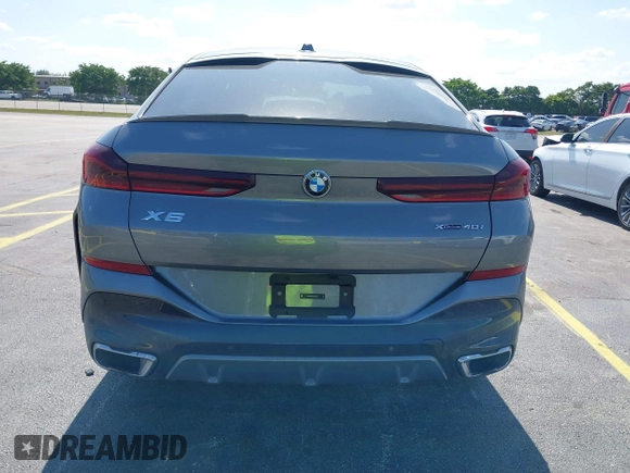 2025 BMW X6 xDrive40i z VIN 5UX33EX04S9X20728, wystawiony jako IAAI lot #42192580 z przebiegiem 22 906 mil mil oraz . Historia ofert i sprzedaży dostępna na DreamBid. Obrazek 16.