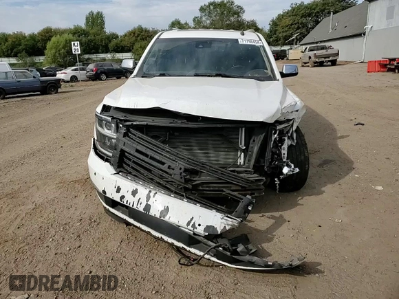 2015 Chevrolet Tahoe LTZ with VIN 1GNSKCKC1FR310018, listed as a Copart auction lot 71798454 with 244,179 mi miles and Salvage title. Bid and sale history available at DreamBid. Image 12.