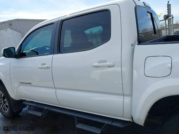 2020 Toyota Tacoma 4WD SR5 with VIN 3TMCZ5AN3LM309635, listed as a IAAI auction lot 41598363 with 99,080 mi miles. Bid and sale history available at carsss.com. Image 14.