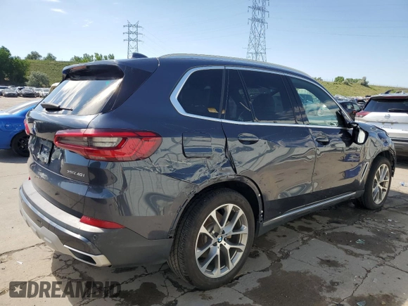 2020 BMW X5 xDrive40i with VIN 5UXCR6C06LLL75359, listed as a Copart auction lot 60897885 with 66,631 mi miles and Salvage title. Bid and sale history available at DreamBid. Image 3.