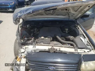 2001 Ford Crown Victoria Police Police Interceptor with VIN 2FAFP71W61X192261, listed as a Copart auction lot 69208974 with 163,632 mi miles and Salvage Title. Bid and sale history available at carsss.com. Image 13.