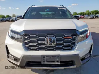 2023 Honda Passport TrailSport with VIN 5FNYF8H64PB007652, listed as a Copart auction lot 54064025 with 22,870 mi miles and Salvage title. Bid and sale history available at DreamBid. Image 5.