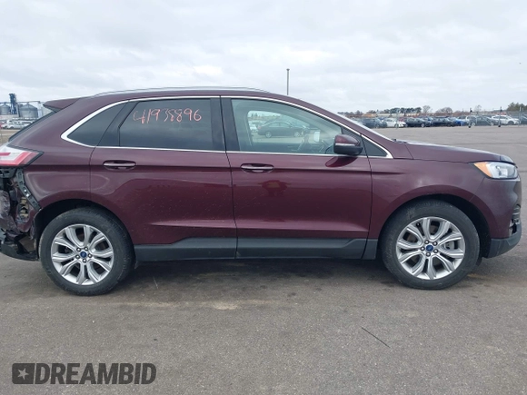 2020 Ford Edge Titanium z VIN 2FMPK4K91LBB56297, wystawiony jako IAAI lot #41938896 z przebiegiem 79 875 mil mil oraz . Historia ofert i sprzedaży dostępna na DreamBid. Obrazek 13.
