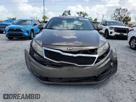 2013 Kia Optima EX z VIN 5XXGN4A72DG188821, wystawiony jako Copart lot #65546495 z przebiegiem 187 286 mil mil oraz Szkoda całkowita • Salvage title. Historia ofert i sprzedaży dostępna na DreamBid. Obrazek 5.