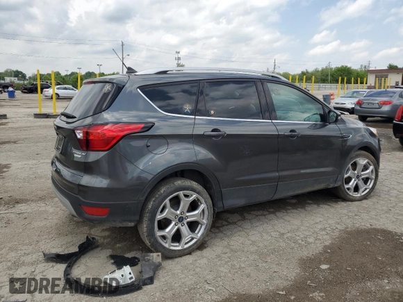 2019 Ford Escape Titanium with VIN 1FMCU0J93KUA81968, listed as a Copart auction lot 56232665 with 26,631 mi miles and Salvage title. Bid and sale history available at DreamBid. Image 3.