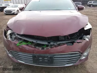 2013 Toyota Avalon XLE with VIN 4T1BK1EB4DU029014, listed as a IAAI auction lot 41689404 with 130,297 mi miles. Bid and sale history available at carsss.com. Image 6.