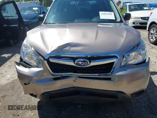 2014 Subaru Forester 2.5i with VIN JF2SJAAC4EH516103, listed as a IAAI auction lot 42065064 with 140,531 mi miles and . Bid and sale history available at DreamBid. Image 6.
