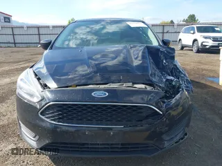 2018 Ford Focus SE z VIN 1FADP3F20JL288437, wystawiony jako IAAI lot #42278885 z przebiegiem 132 504 mil mil oraz . Historia ofert i sprzedaży dostępna na DreamBid. Obrazek 12.