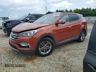 2018 Hyundai Santa Fe 2.4L with VIN 5XYZUDLB3JG519796, listed as a Copart auction lot 61969005 with 162,466 mi miles and Salvage title. Bid and sale history available at DreamBid. Image 1.