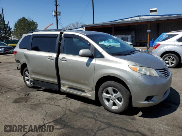 2015 Toyota Sienna LE AAS with VIN 5TDKK3DCXFS627254, listed as a Copart auction lot 49837295 with 107,701 mi miles and Salvage Title. Bid and sale history available at DreamBid. Image 4.