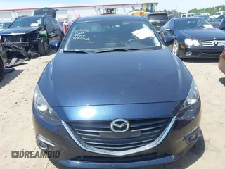 2015 Mazda 3 i Touring with VIN 3MZBM1V70FM228253, listed as a IAAI auction lot 42198130 with 61,236 mi miles and . Bid and sale history available at DreamBid. Image 13.