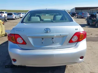 2010 Toyota Corolla with VIN 1NXBU4EE5AZ260859, listed as a IAAI auction lot 41647848 with 129,074 mi miles and . Bid and sale history available at DreamBid. Image 16.