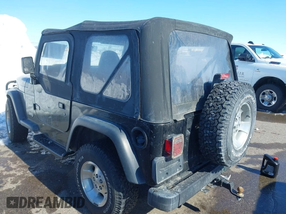 1999 Jeep Wrangler Sport with VIN 1J4FY19SXXP456810, listed as a IAAI auction lot 41725834 with 93,151 mi miles. Bid and sale history available at carsss.com. Image 3.