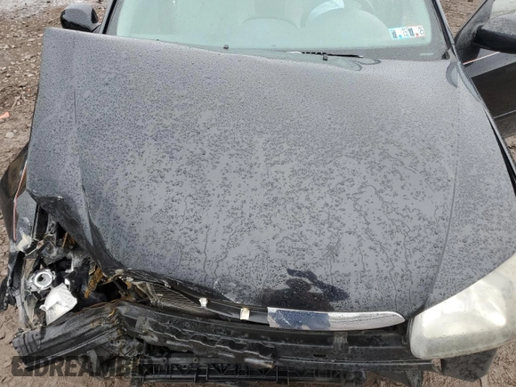2009 Kia Spectra EX with VIN KNAFE222495648220, listed as a Copart auction lot 52886915 with 146,417 mi miles and Salvage title. Bid and sale history available at DreamBid. Image 12.