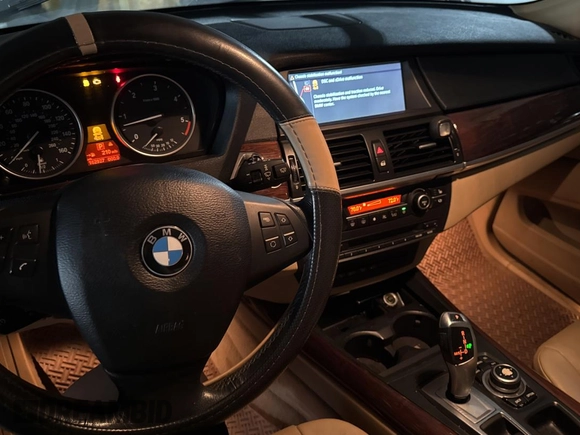 2011 BMW X5 35d with VIN 5UXZW0C55BL661651, listed as a Copart auction lot 61866905 with 162,927 mi miles and Clean title. Bid and sale history available at DreamBid. Image 9.